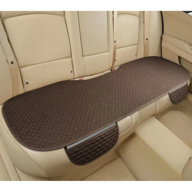 Linen car cushion with plaid pattern in choice of colours including black and red, coffee, or cream