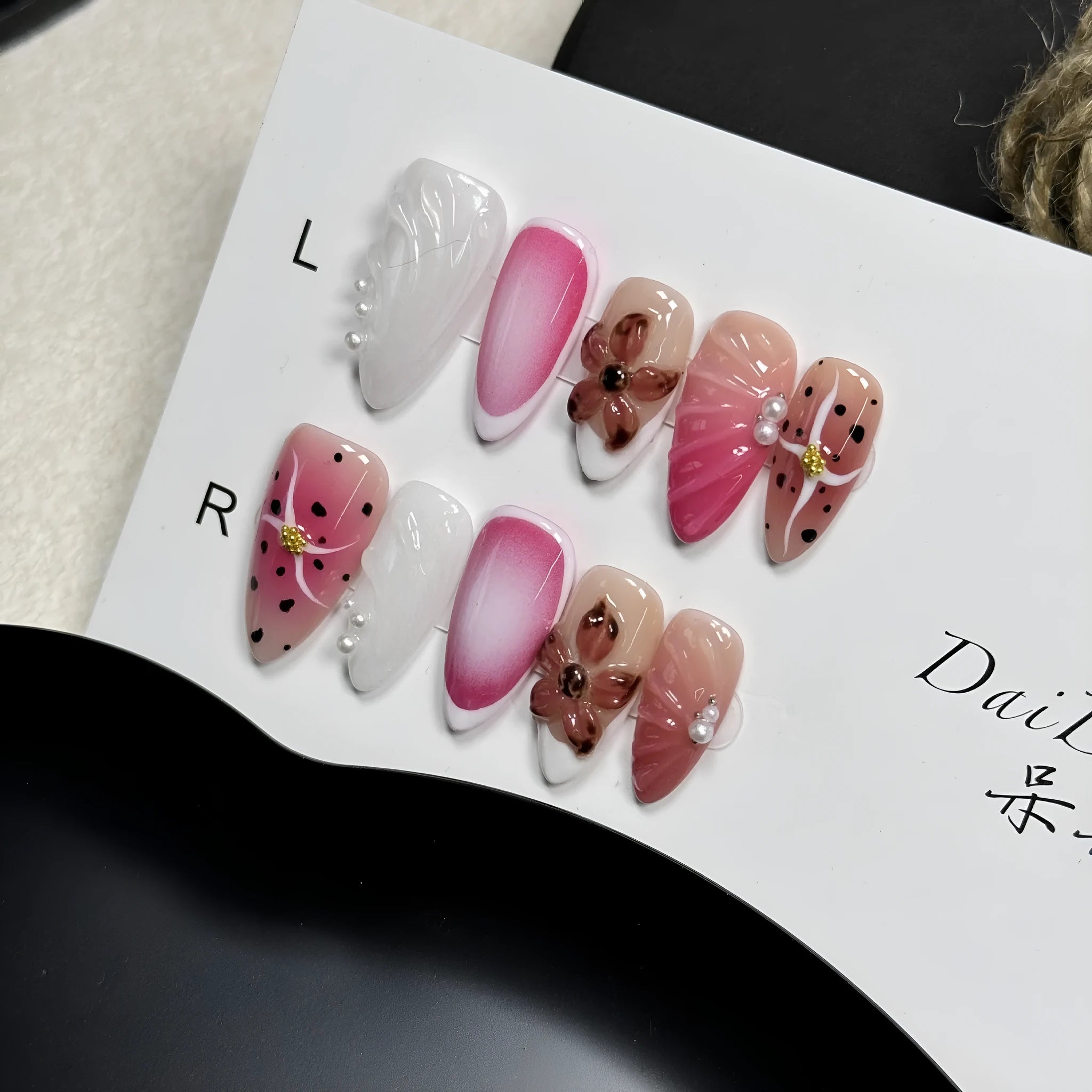 Hand-painted 3D carved nail art patches with candy patterns for almond-shaped nails.