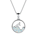 Geometric fishtail pendant necklace with electroplated white gold finish and round decorative elements