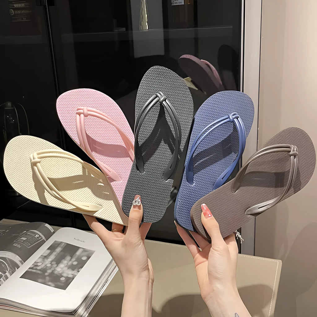 Men's PVC flip flops in a toe-covering style with a non-slip sole, shown in one of the available colours