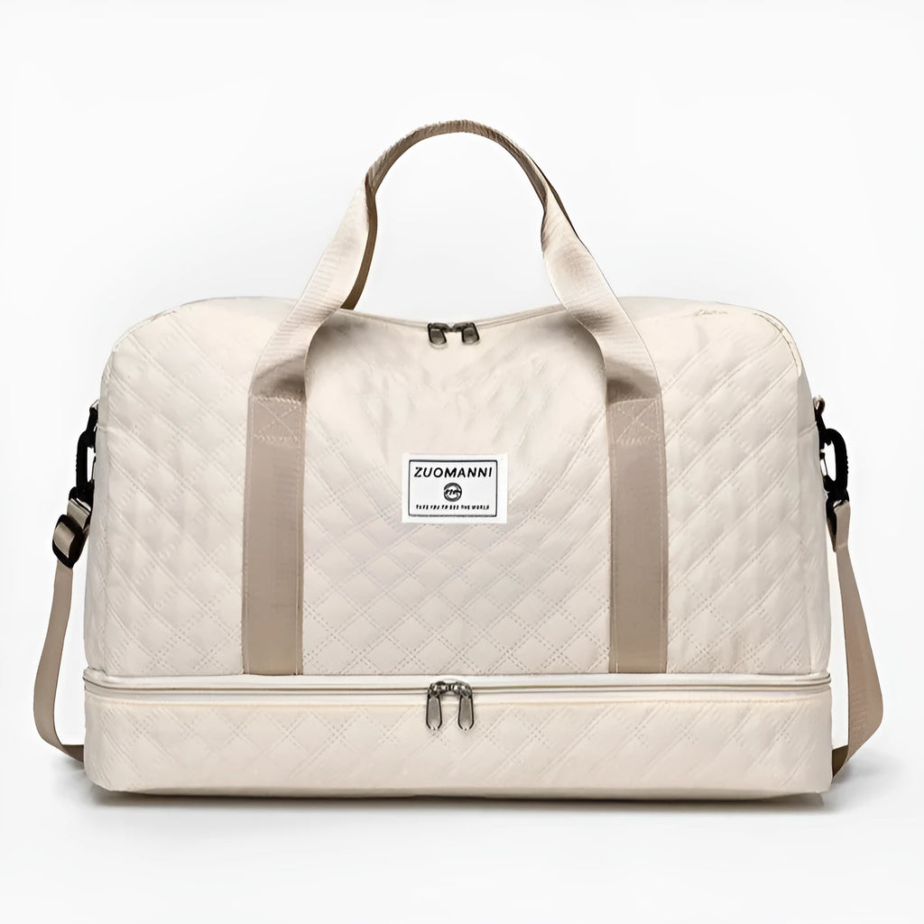 Large grey and pink Oxford cloth leisure travel bag with sewing thread detail on a white background.