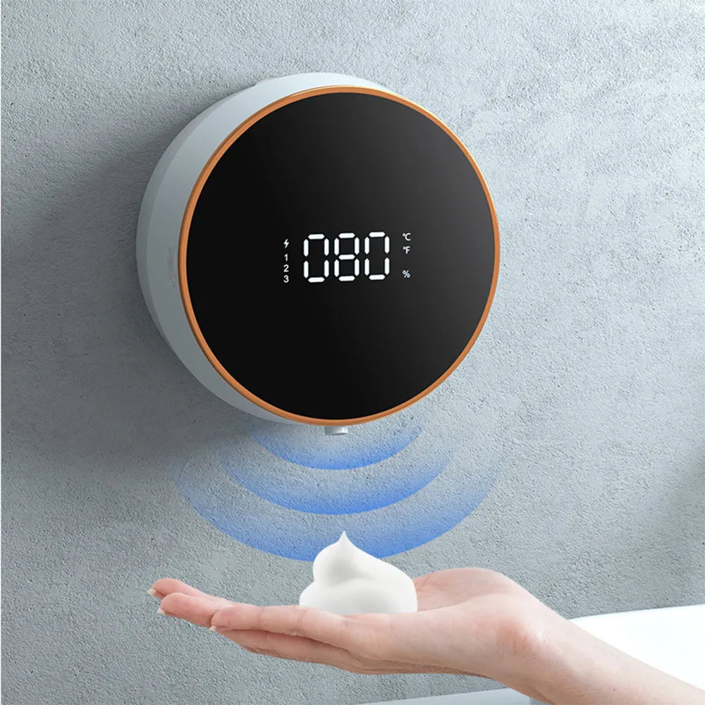 Black wall-mounted automatic foam soap dispenser with a USB charging port.