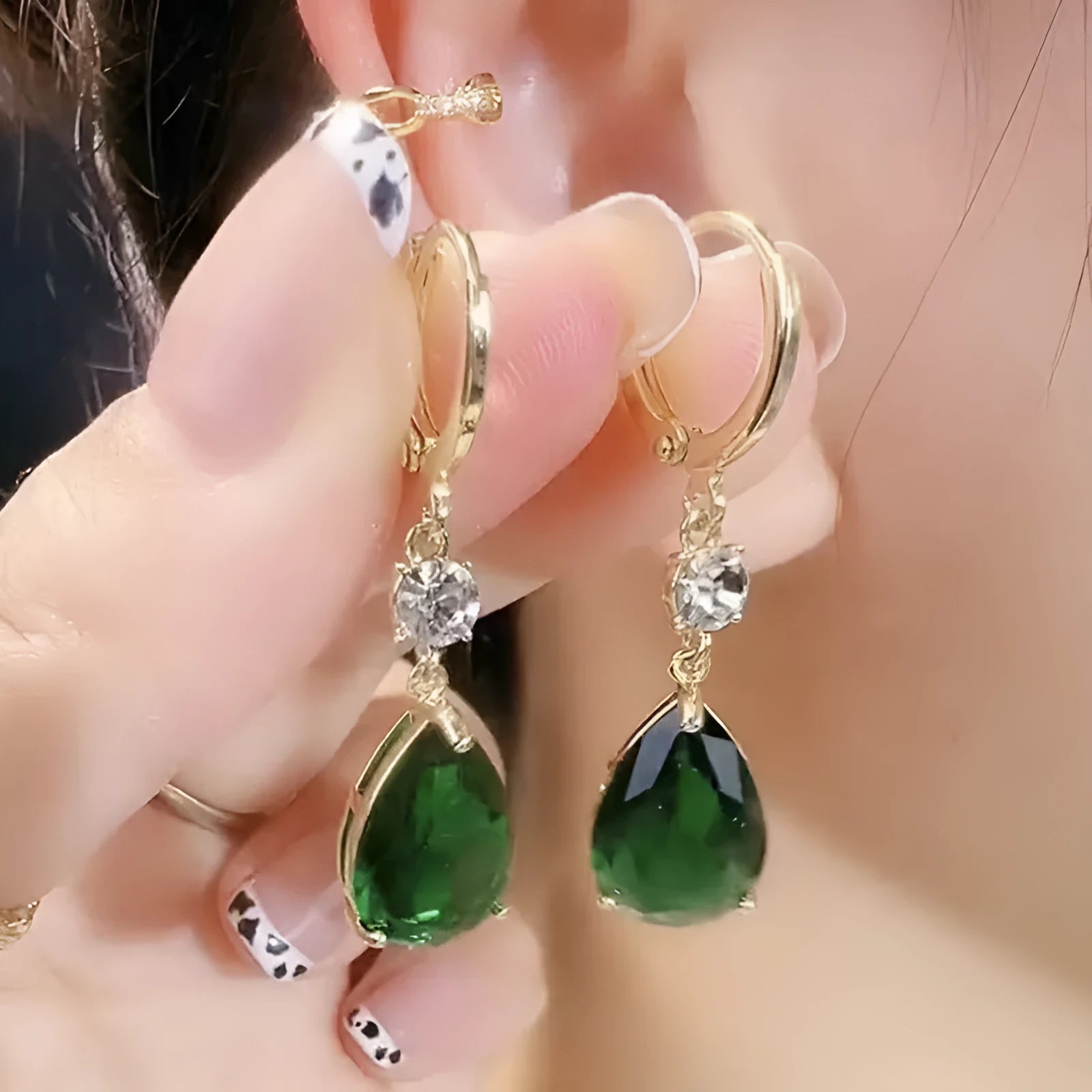 Green geometric teardrop alloy drop earrings for pierced ears.