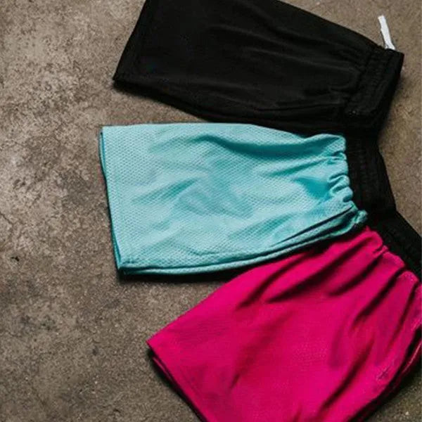Men's mesh quick-drying shorts in solid colours for summer running and fitness