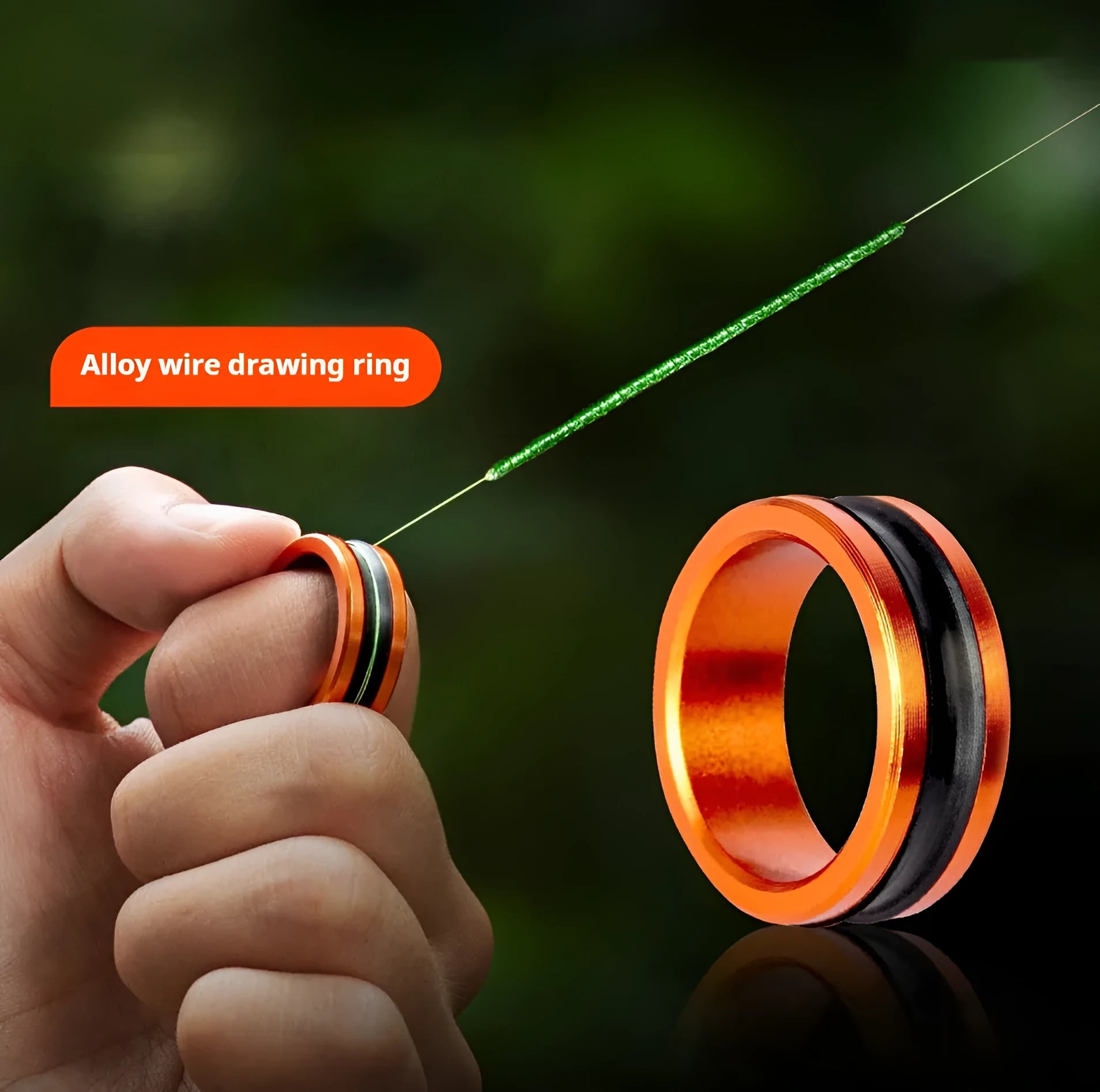 Orange and silver alloy fishing hand guard tool with non-slip grip surface for hook removal