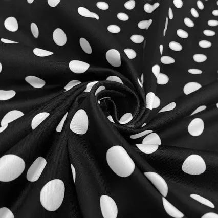 Women's mid-length polka dot dress with square collar, front zip, and pleated skirt