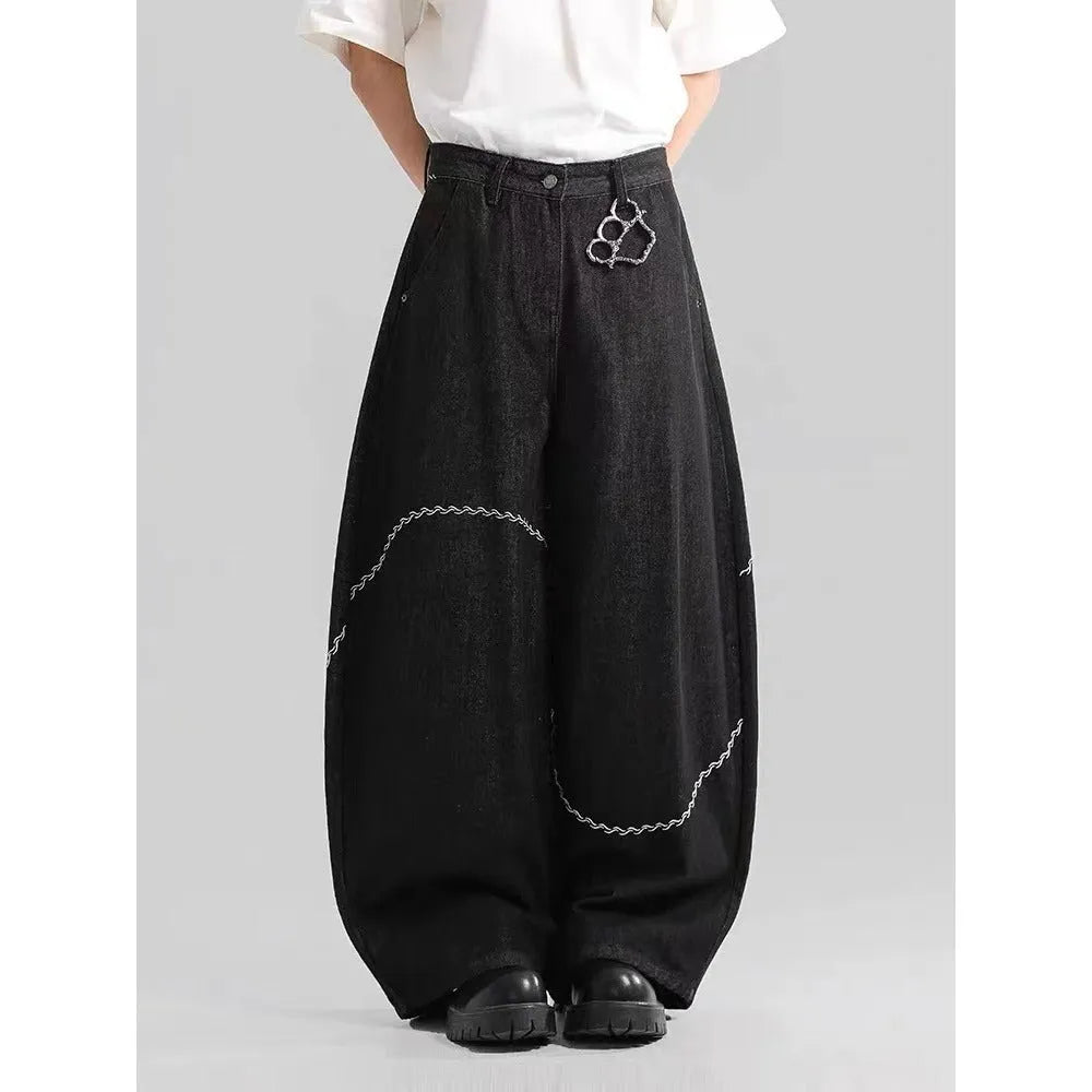 Black straight-leg denim trousers with mid-waist and zip fly for autumn winter wear