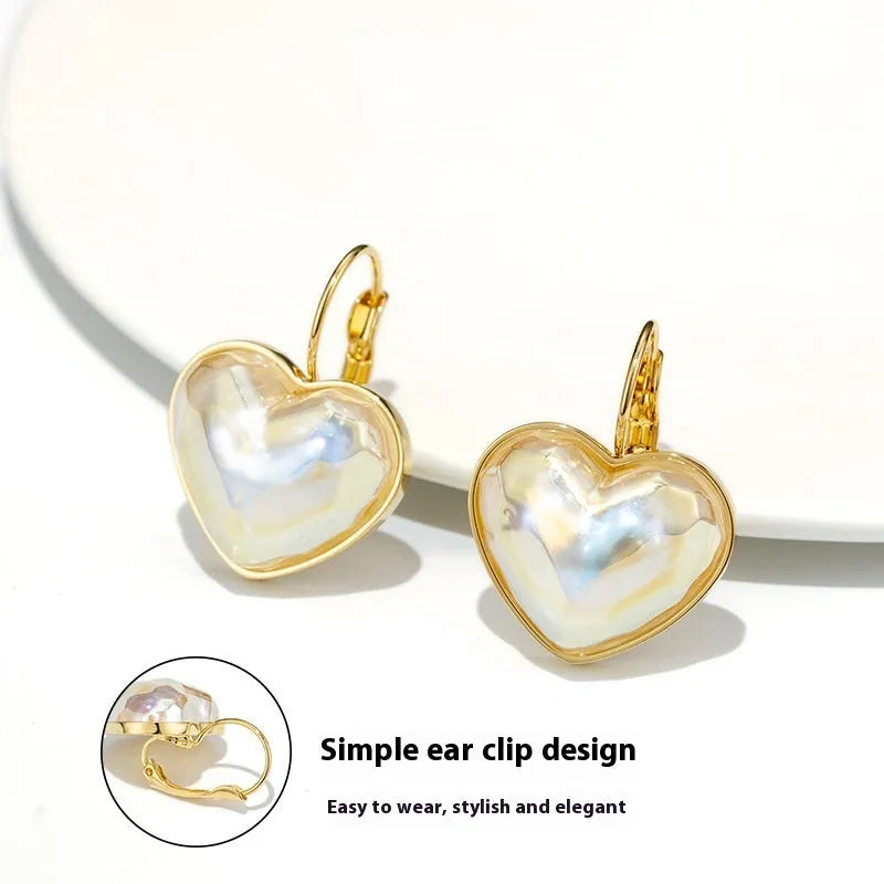 Gold colour clip-on earrings for women with metal alloy construction and natural summer style design
