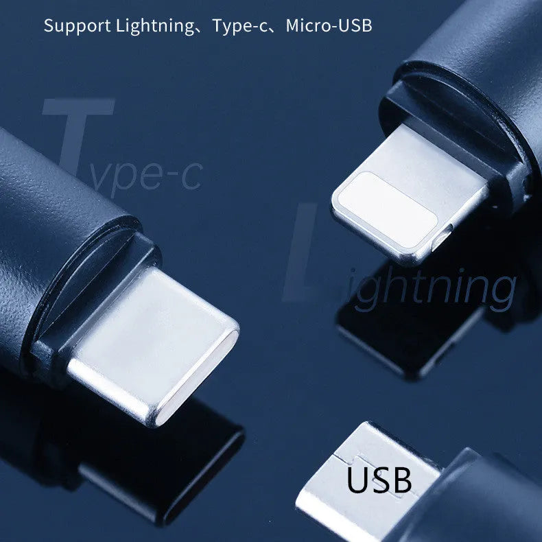 Small black capsule infrared remote control adapter for smartphone.