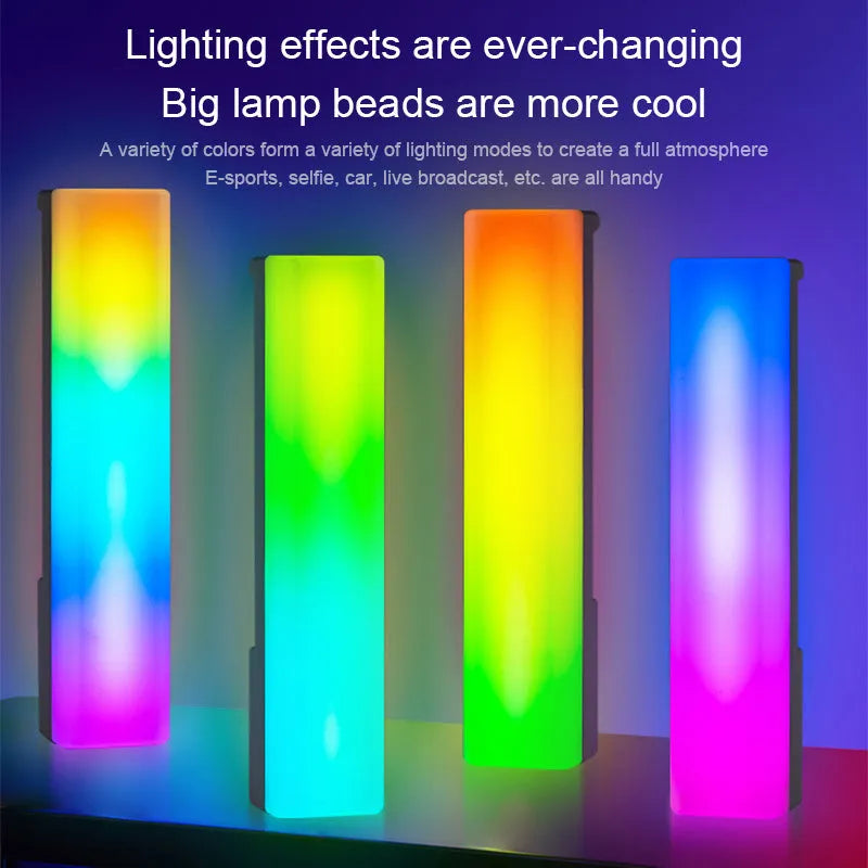 Black and white 3D RGB voice-activated music rhythm ambiance lamp on a table.