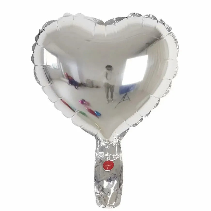 Five aluminium foil peach heart balloons in metallic colours arranged together