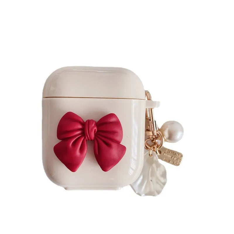Beige red bow shell clamshell TPU protective cover for AirPods Pro wireless earphone case.