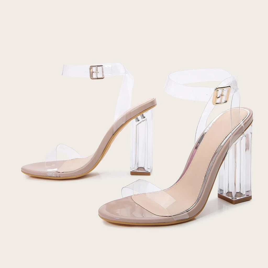 Women's apricot heeled sandals with clear glass heels and buckle closure