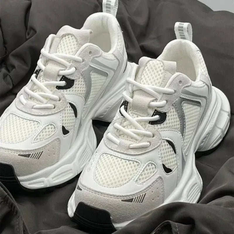 Beige mesh platform shoes with wedge heel and lace-up front showing breathable material and rubber sole