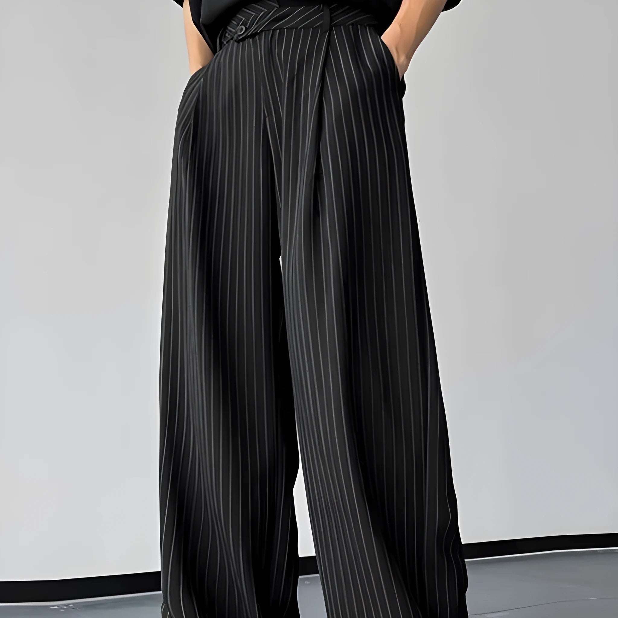 Black men's trousers with vertical stripes and front pleats on a high elasticity fabric.