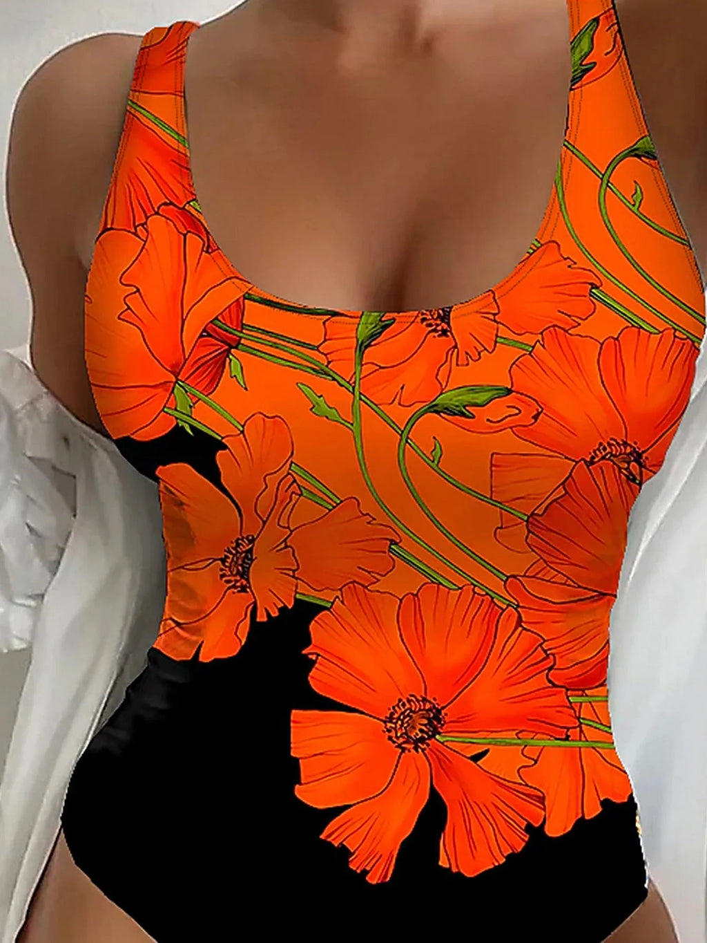 Orange flowers printed backless one-piece swimsuit with slim fit design on mannequin