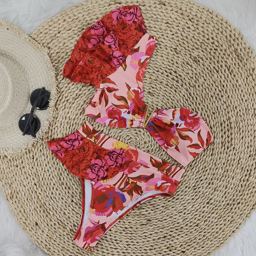 Women's one-shoulder ruffled floral print bikini set with high-waisted briefs in pink and red colours