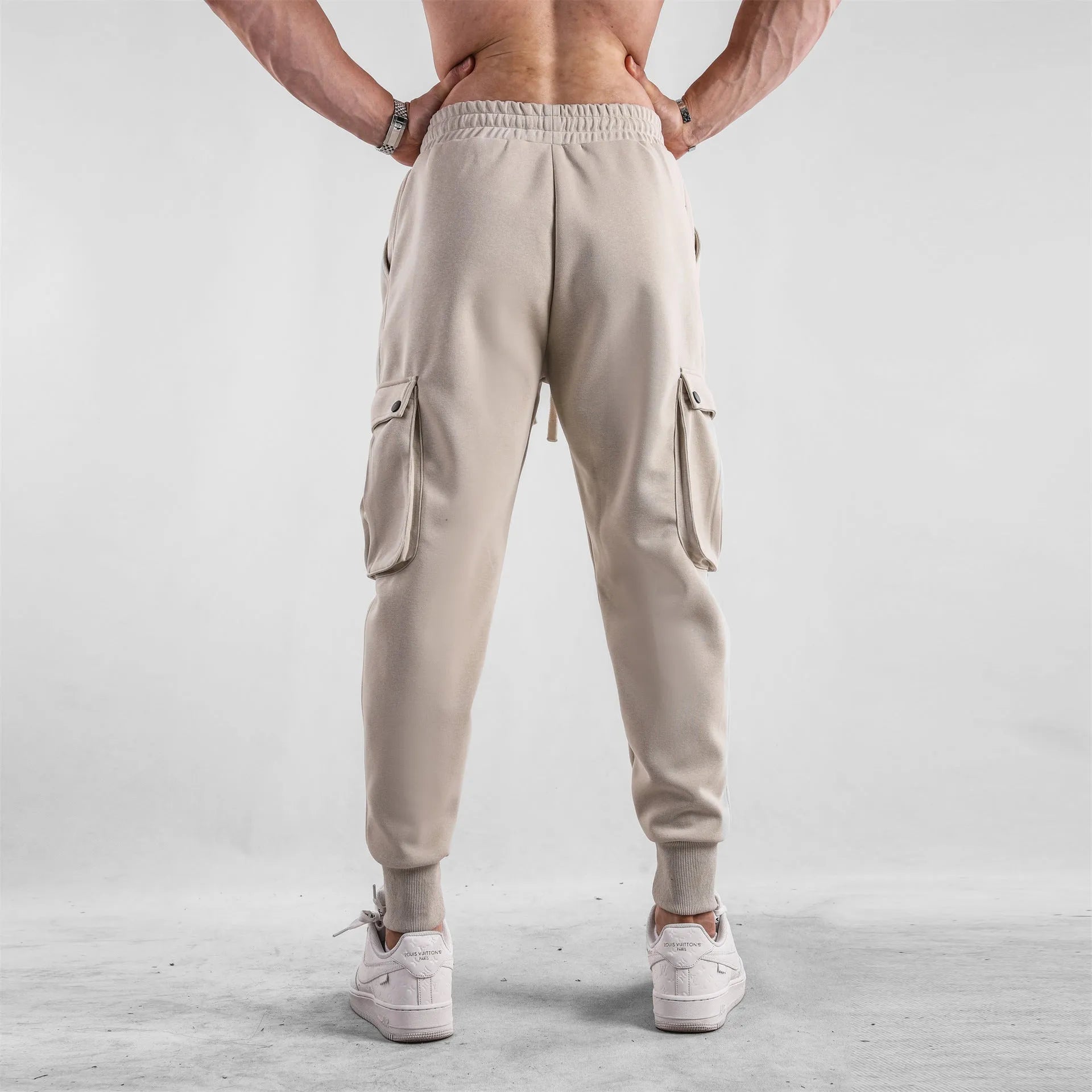 Men's loose cotton sports trousers with multi-pockets and ankle-tied cuffs in six colour options