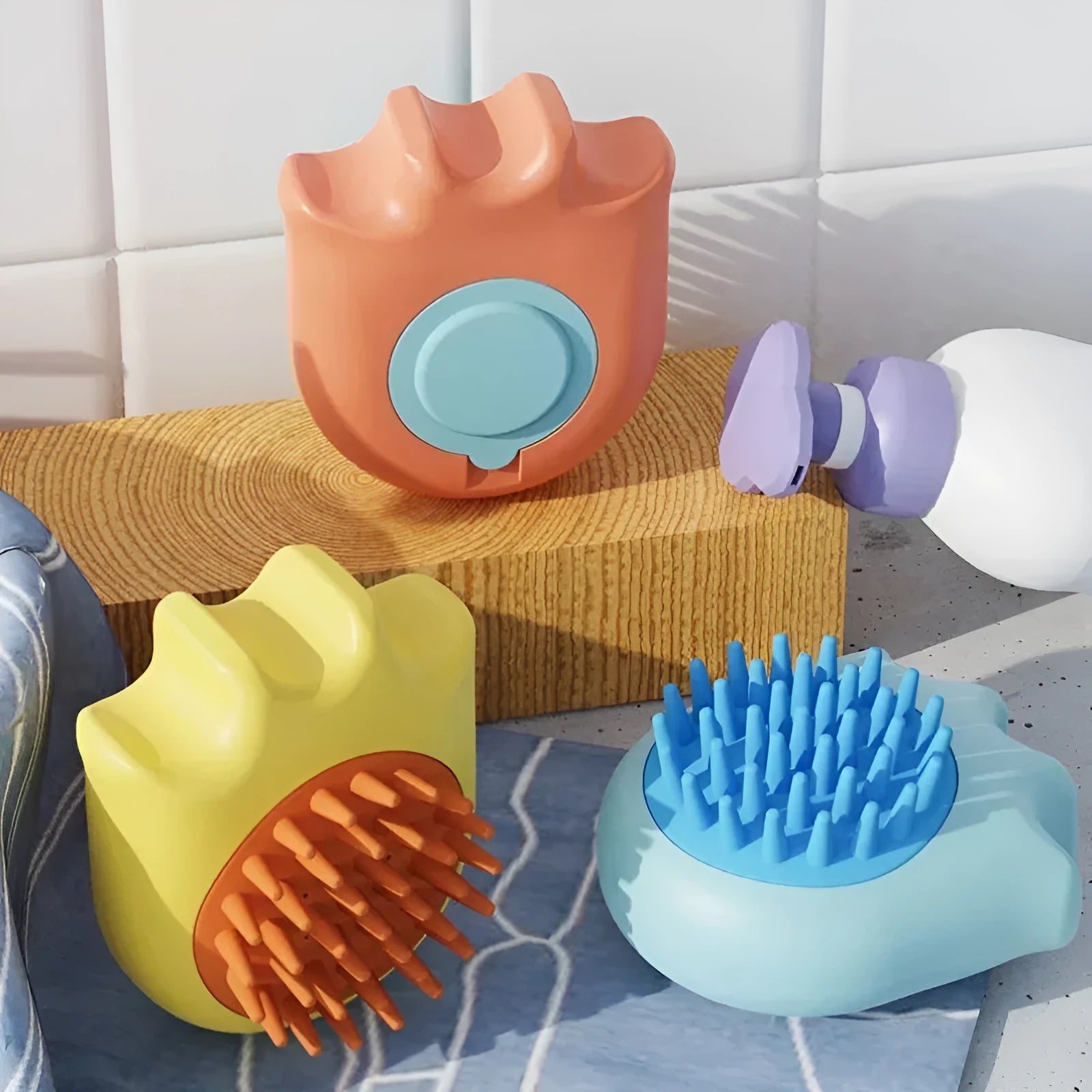Blue pet bath brush with integrated shampoo compartment for cats and dogs grooming