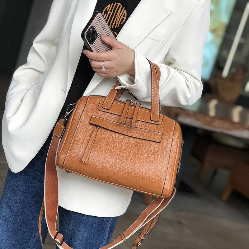 Soft genuine leather shoulder messenger bag with Boston lychee pattern and internal organiser pockets.