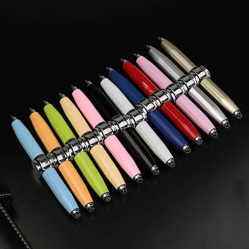 Metal LED ballpoint pen with spinning gyro mechanism showing multiple ink colour options