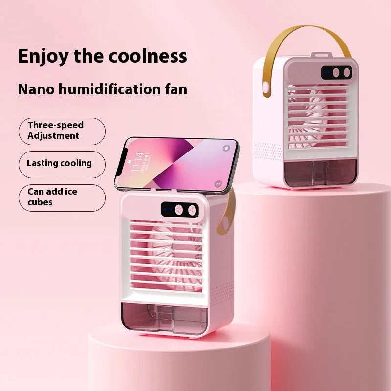 Dark green portable USB desktop air humidifier with brushless motor on a wooden desk.
