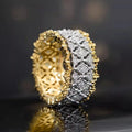 Geometric zircon ring with two-tone gold and silver finish and round centre stone