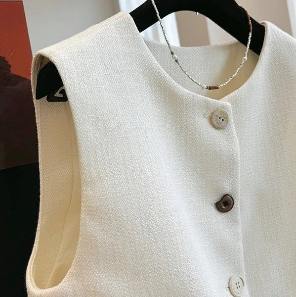 French style bandage vest for women with round neckline and sleeveless design in milky white colour