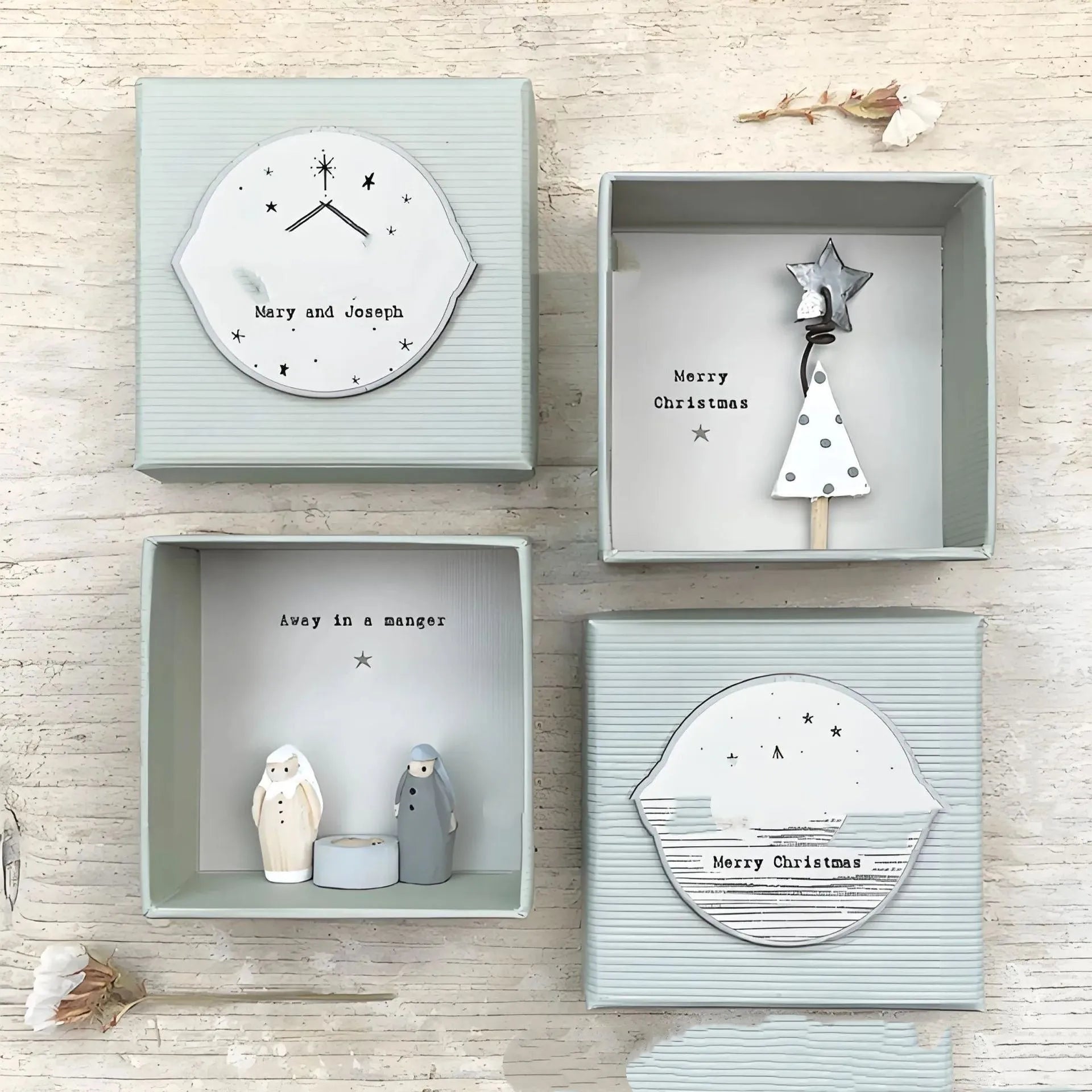 Boxed guardian angel resin ornament in a modern cartoon style.