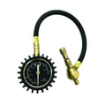 Red mechanical tyre pressure gauge with deflation valve for vehicle maintenance