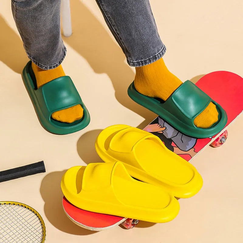 Thick-soled EVA flip-flop slippers in multiple colours on a white background.