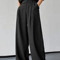 Black men's trousers with vertical stripes and front pleats on a high elasticity fabric.
