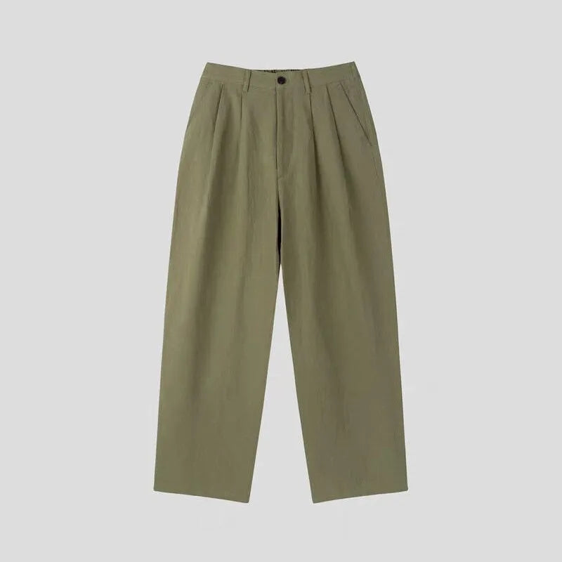 Men's apricot-coloured loose-fit cotton linen trousers with a wide-leg cut and elastic waistband