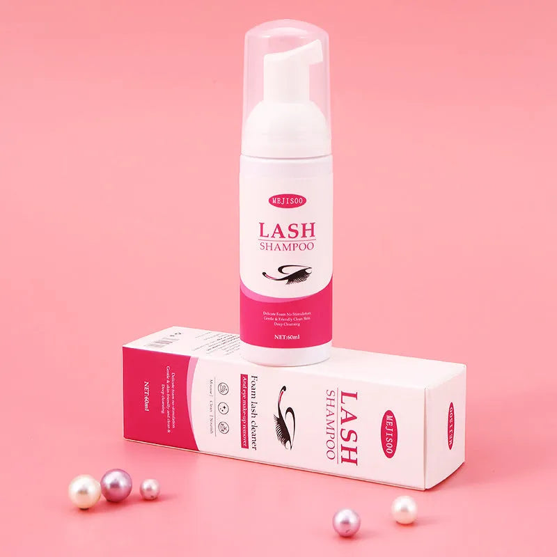 60ml bottle of lash shampoo mousse eyelash cleaning solution for removing extensions.