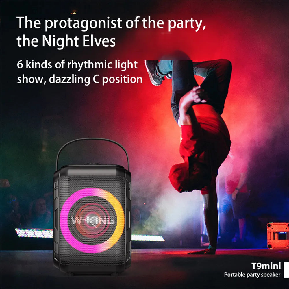 Black Bluetooth speaker with cool light circle in horizontal position on table