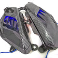 Pair of Yamaha NMAX LED side lamps with carbon fibre design on a blue background.