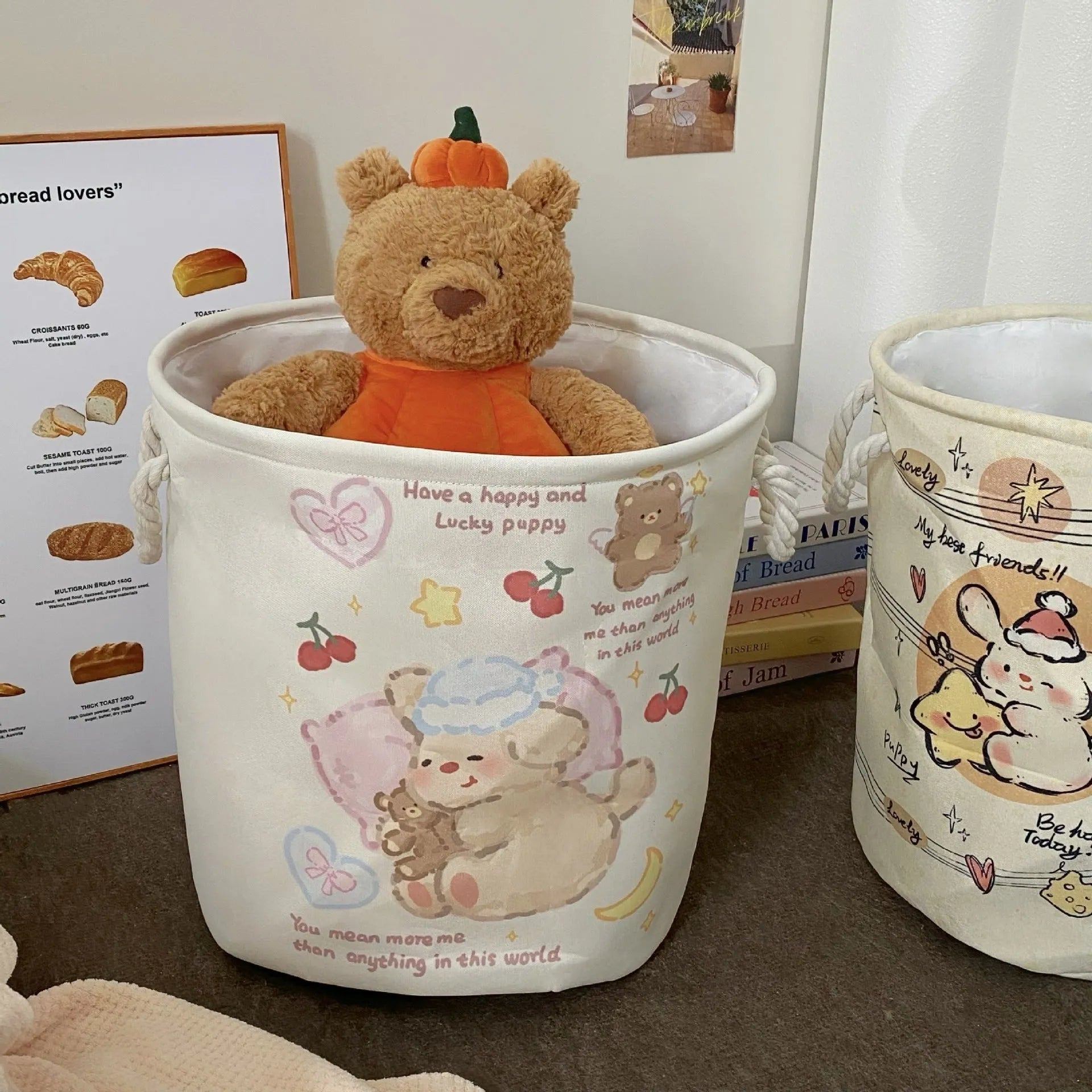 Foldable cotton laundry basket in decorative pattern options including Good Night Bear and Mint Green Western Highland