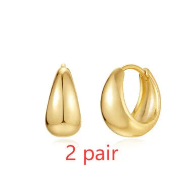 Brass diamond earclip earrings with electroplated golden finish and geometric design