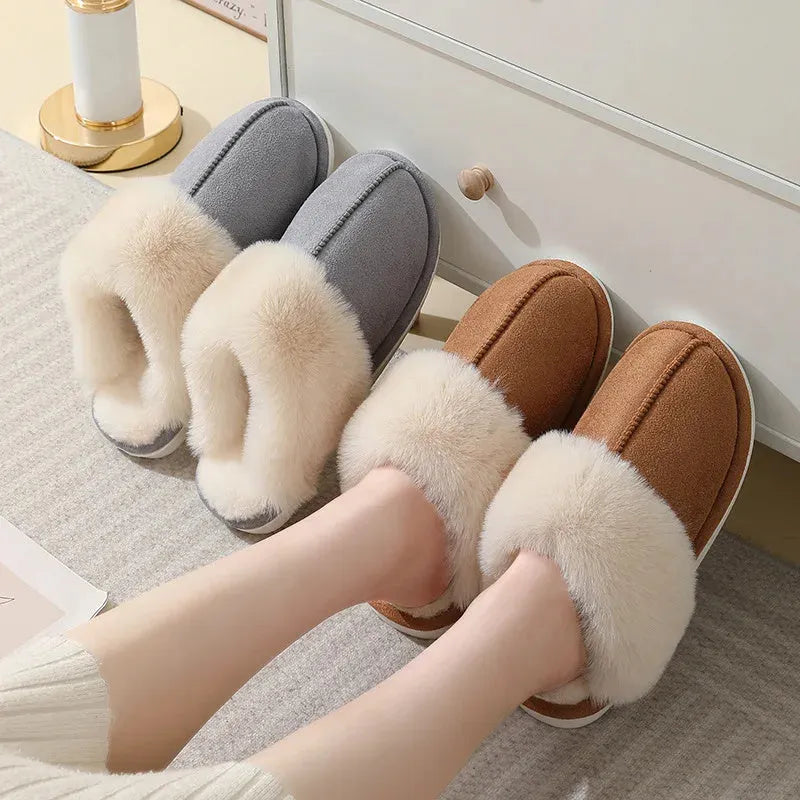 Women's brown plush indoor slippers with round toe, flat heel, and textured non-slip sole.