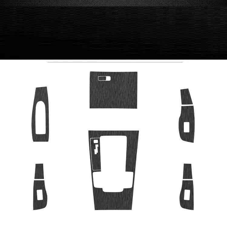 Car interior decorative film sticker kit showing centre console, instrument panel, and trim pieces