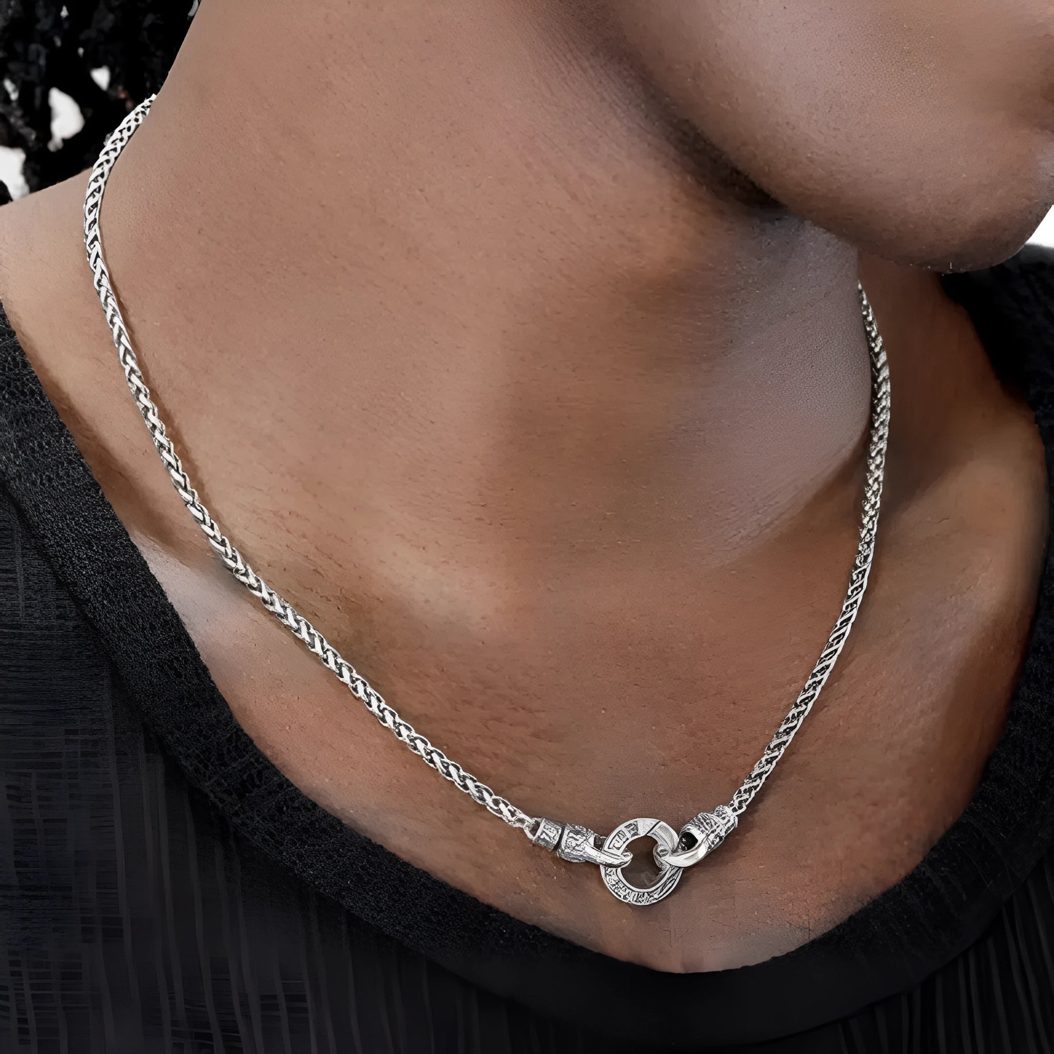 Sterling silver clavicle necklace for women with solid pendant on a delicate chain.