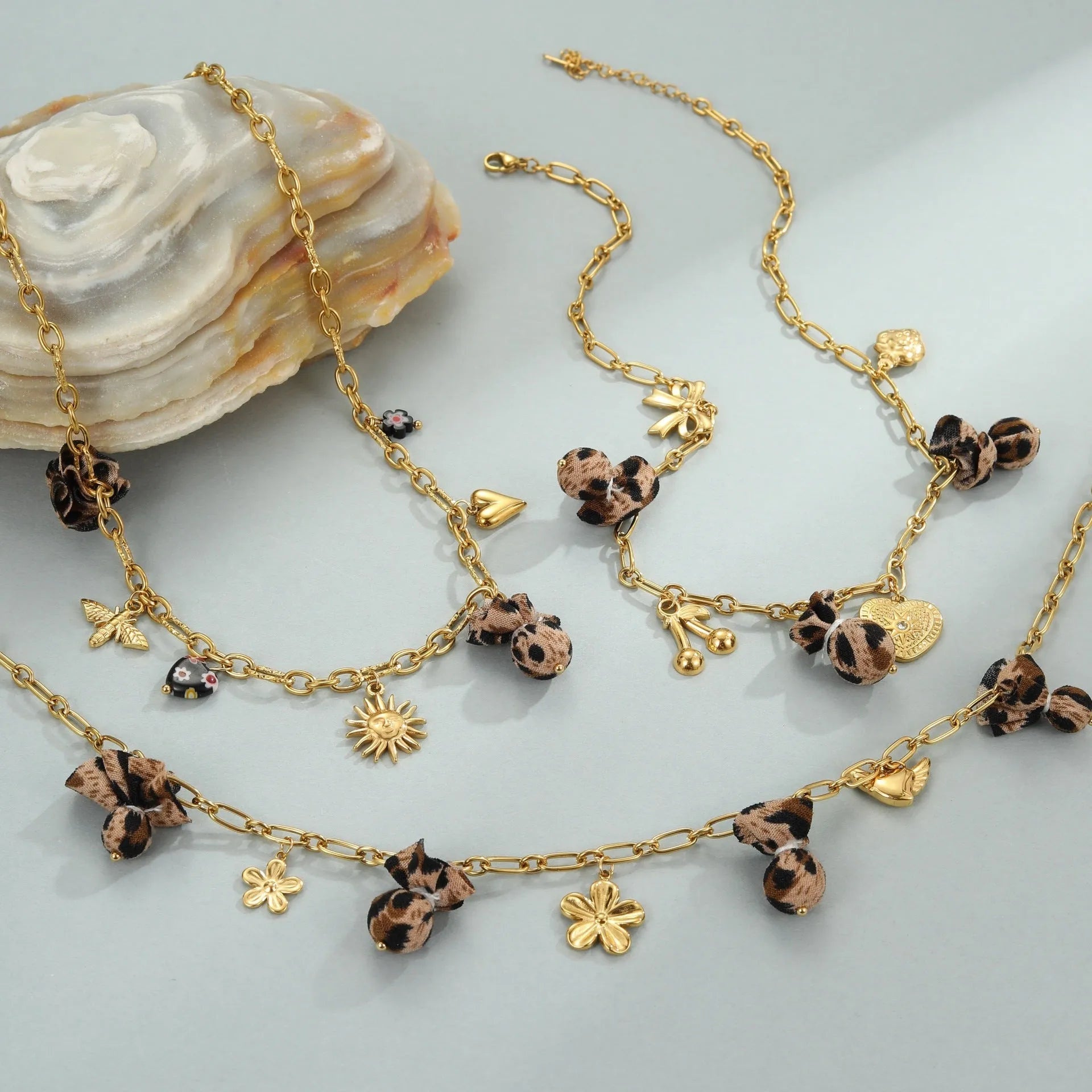 Geometric leopard pendant necklace with love hearts and flowers on adjustable stainless steel chain