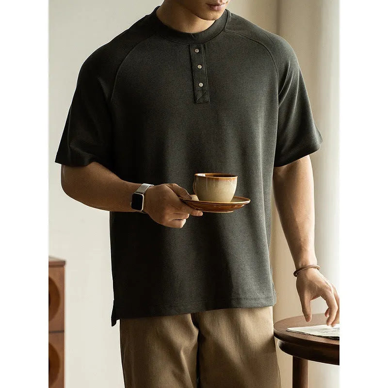 Women's casual gray pullover top with raglan sleeves and a terry texture fabric.