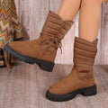 Women's black suede chunky heel snow boots with lace-up design and high top.