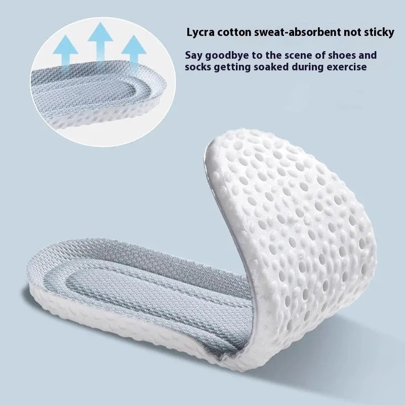 A pair of grey high-elasticity PU foam sports insoles on a white background, shown with scissors to illustrate the cut-to-fit design.