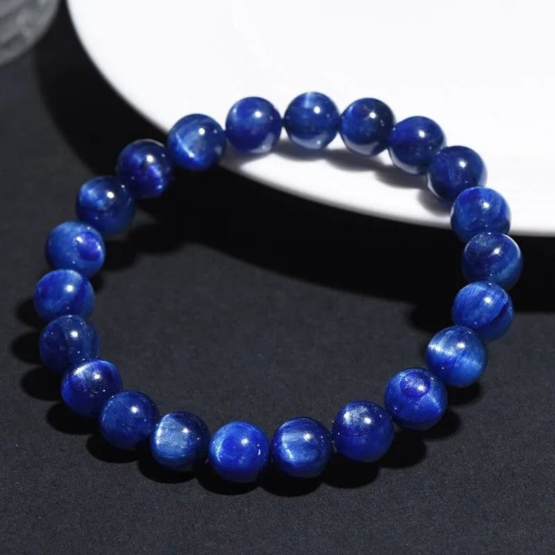 Natural blue crystal ball bracelet with geometric design and Ruyi pattern on wrist