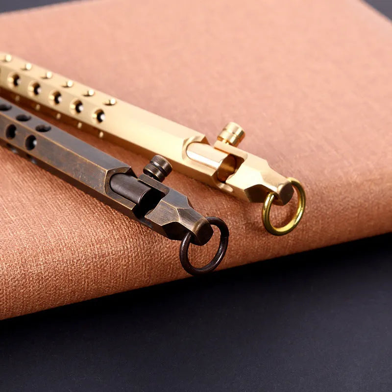 Brass hexagonal bolt action pen showing six-sided barrel and bolt mechanism in natural brass finish