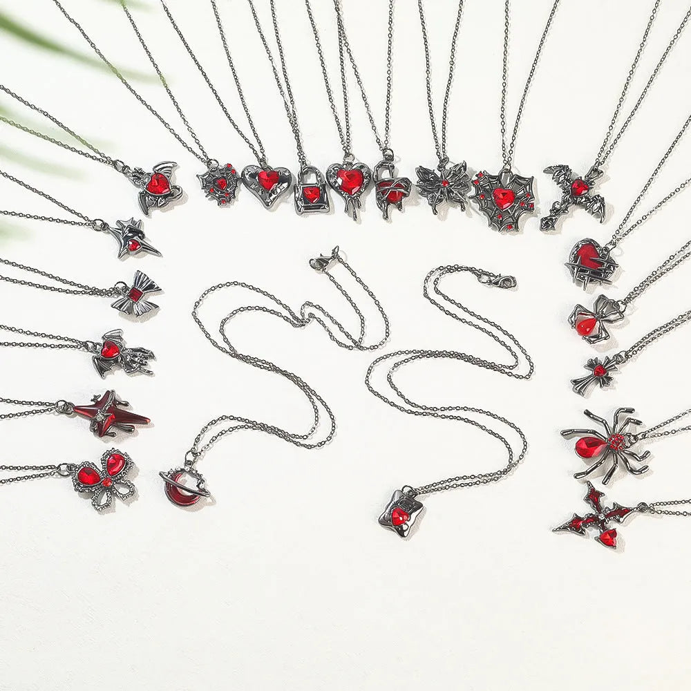 Women's zinc alloy Halloween necklace showing spider, bat, and skull wing pendant designs on a regular chain.