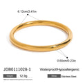 Women's stainless steel bracelet with electroplated finish, geometric round shape on a woman's wrist