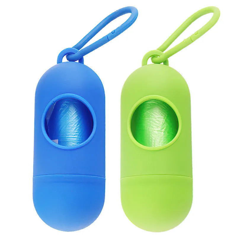 Compact dog waste bag dispenser with clip hook showing Velcro fastening for securing waste bag rolls